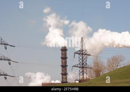 Smoke from the pipe of an industrial enterprise.  Stock Photo