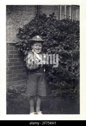 Happy Smiling Young Caucasian Boy Aged 4 Dressed up in His Cowboy Outfit Stock Photo