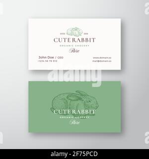 Cute Rabbit Organic Grocery Store. Abstract Vector Logo and Business Card Template. Hand Drawn Engraving Style Rabbit Sillhouette Sketch with Retro Stock Vector