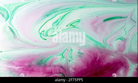 The colors of the aqueous ink are translucent. Abstract multicolored marble texture background Stock Photo