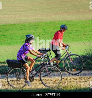 Senior group doing a cycling tour in beautiful nature in southern germany Stock Photo