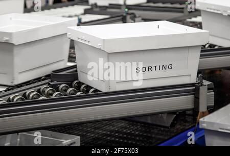 Automatic sorting system of plastic tray in production line Stock Photo