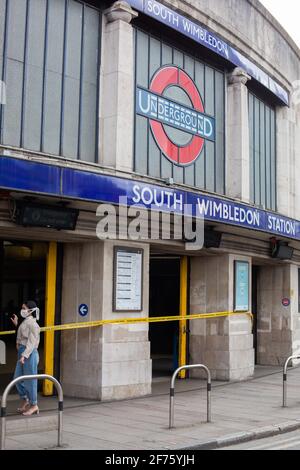 London, UK. 05th Apr, 2021. A general view of South Wimbledon Underground Station which is closed while emergency services attend to a casualty on the track . Picture date: Monday April 5th, 2021. Photo credit should read Credit: Katie Collins/Alamy Live News