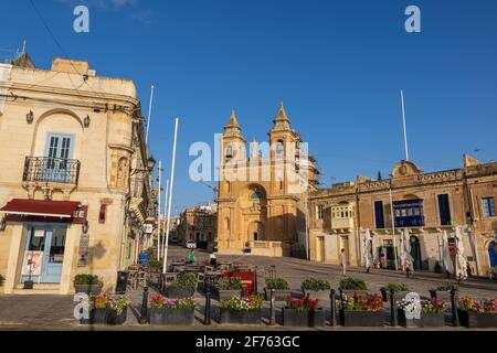 Marsaxlokk fishing village in Malta, Parish Church of Our Lady of Pompei in the middle. Stock Photo