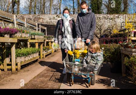 A family with children visiting Smeaton nursery garden centre, East Linton, East Lothian, Scotland, UK Stock Photo