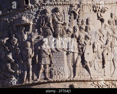 Rome. Italy. Trajan's Column (Colonna Traiana), AD 113. Detail shows Roman Emperor Trajan addressing his troops (Adlocutio).  The Column of Trajan com Stock Photo