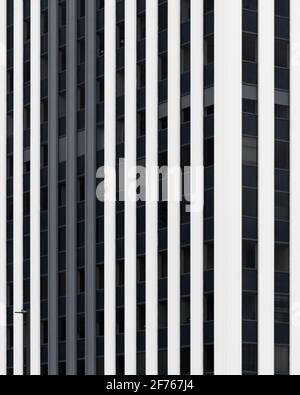 Architectural abstract of the striped black and white towers of Oak Brook 22 Tower One on 22nd Street in Oak Brook, Illinois Stock Photo