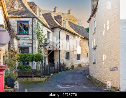 Narrow lane in Nailsworth Town in the Cotswolds, Gloucestershire, United Kingdom Stock Photo