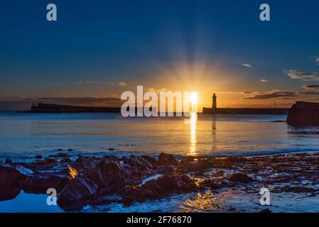 Just a few minutes after sunrise on midsummer morning at Donaghadee harbour, County Down, Northern Ireland. Stock Photo