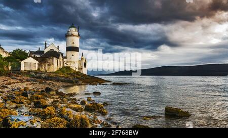 Evening by the lighthouse at Cloch Point on the Firth of Clyde, Scotland. Stock Photo