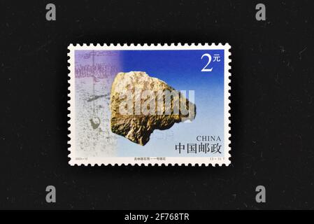 CHINA - CIRCA 2003: A stamps printed in China shows The Meteorite Shower over Jilin,  circa 2003. Stock Photo