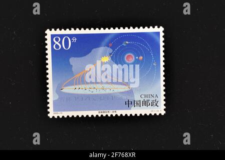 CHINA - CIRCA 2003: A stamps printed in China shows The Meteorite Shower over Jilin,  circa 2003. Stock Photo