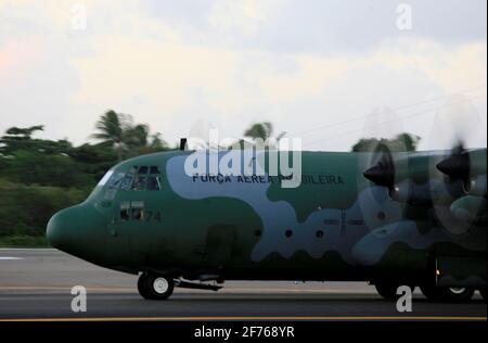 salvador, bahia / brazil  - July 6, 2014: C-130 Hercules of the Brazilian Air Force (FAB) prepares to take off on Salvador airport runway. *** Local C Stock Photo