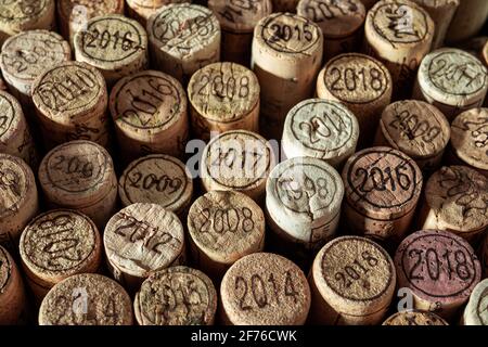 Corks of different years from different French wines as background Stock Photo