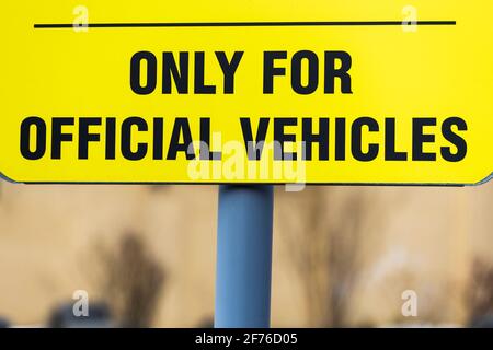 yellow sign with the inscription only of the employees' vehicles. car park. High quality photo Stock Photo