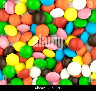 Rainbow bright candies. Cheerful colorful childrens yummy background Stock Photo