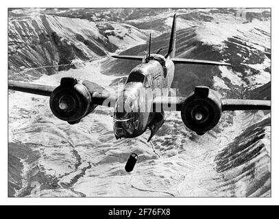 WW2 Allied aerial bombing by Martin 187 Baltimore light bomber of RAF pin point bombing droppping bombs on the railway junction at Sulmona, Italy. 1944 Stock Photo