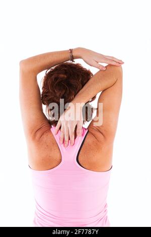 Mature woman stretching Stock Photo