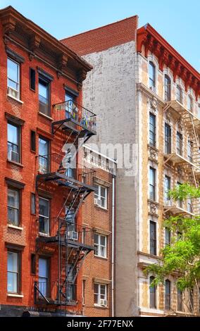 Picture of old buildings with fire escapes, New York City, USA Stock ...