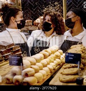 France, Paris, Bakery House Marques, pastries and breads, saleswomen Stock Photo