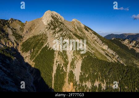 Pedraforca west face aerial view in a spring afternoon over Gósol Valley (Barcelona province, Catalonia, Spain, Pyrenees) Stock Photo