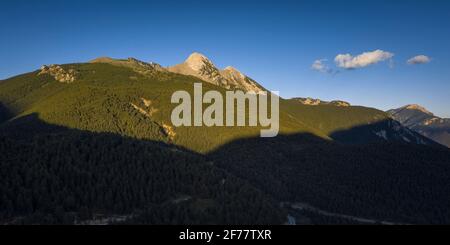 Pedraforca west face aerial view in a spring sunset over Gósol Valley (Barcelona province, Catalonia, Spain, Pyrenees) ESP: Vista aérea del Pedraforca Stock Photo