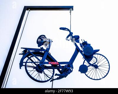 Old painted Solex / VeloSolex motorcycle moped on display as artwork installation in the courtyard of the Chateau de Dissay, Vienne (86), France. Stock Photo