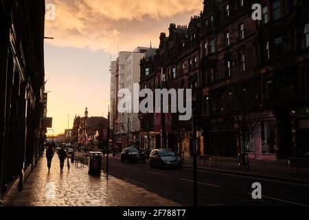 A quiet Sauchiehall Street before sunset, during lockdown. Glasgow city centre, April 2021. Stock Photo