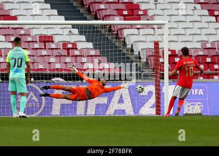 Lisbon, Portugal. 5th Apr, 2021. Luca Waldschmidt of SL Benfica shoots to score a penalty during the Portuguese League football match between SL Benfica and CS Maritimo at the Luz stadium in Lisbon, Portugal on April 5, 2021. Credit: Pedro Fiuza/ZUMA Wire/Alamy Live News Stock Photo