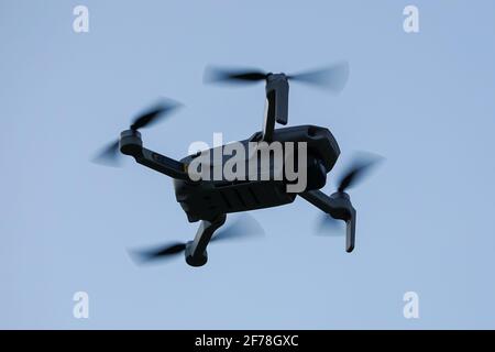 Flying DJI Mini 2 drone Stock Photo