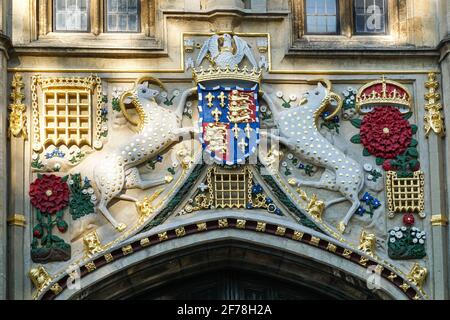 Mythical beasts called yales supporting the shield above the front entrance to Christ's College Porters' Lodge, Cambridge Cambridgeshire England UK Stock Photo