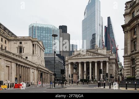 Empty bank junction during the third nationwide lockdown with the Bank of England and City skyscrapers in London, England United Kingdom UK