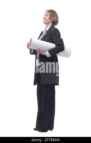 Side view of mature woman architect holding rolled up blueprints Stock Photo