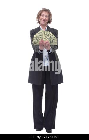 Mature lady holding a bunch of 100-dollar bills with surprised facial expression Stock Photo