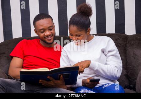 two african student studying their books Stock Photo