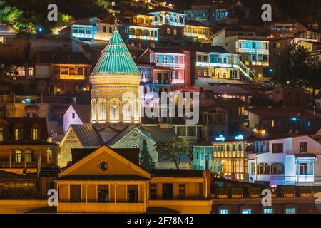 Tbilisi, Georgia. Saint George Armenian Cathedral Of Tbilisi. Church In Evening Or Night Illumination Stock Photo