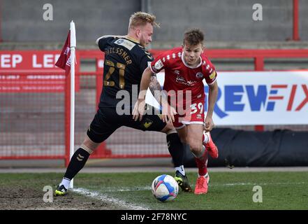 CRAWLEY, ENGLAND. APRIL 5TH Oldham Athletic's Marcel Hilssner tussles with Jake Hessenthaler of Crawley Town during the Sky Bet League 2 match between Crawley Town and Oldham Athletic at Broadfield Stadium, Crawley on Monday 5th April 2021. (Credit: Eddie Garvey | MI News) Credit: MI News & Sport /Alamy Live News Stock Photo
