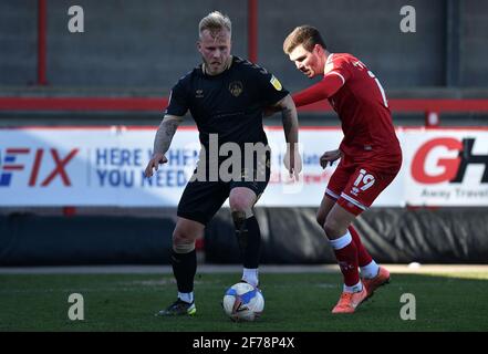 CRAWLEY, ENGLAND. APRIL 5TH Oldham Athletic's Marcel Hilssner tussles with Jordan Tunnicliffe of Crawley Town during the Sky Bet League 2 match between Crawley Town and Oldham Athletic at Broadfield Stadium, Crawley on Monday 5th April 2021. (Credit: Eddie Garvey | MI News) Credit: MI News & Sport /Alamy Live News Stock Photo