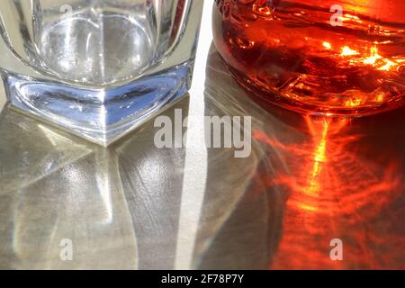 Sunlight shining through a drinking glas showing caustic light effects Stock Photo