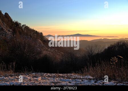 Sunset over valley, view from Vrsatec hill in White Carpathians Stock Photo