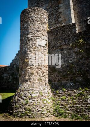 The castle of Sabugal built around 1300 commands the region at the river Coa close to the border to Spain. Detail of a tower and wall with loop-holes in the form of cross Stock Photo