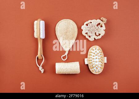 Natural cleaning sponge, massaging brush, plastic free, bamboo and wooden kit, eco bathroom essentials. Sustainable lifestyle concept. Stock Photo