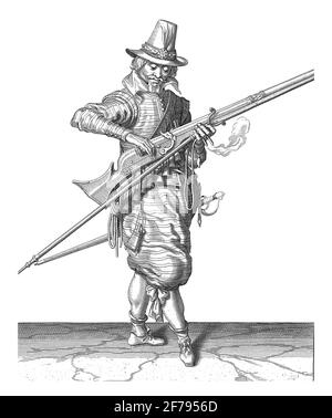 A Soldier, Full Length, to the Right, who closes the pan (the powder container), vintage engraving. Stock Photo