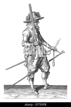 A Soldier, Full Length, to the Right , who is holding a musket (a certain type of firearm), vintage engraving. Stock Photo