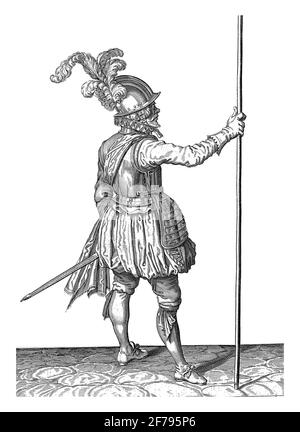 A Soldier, Full-length, seen from the back, holding a skewer (lance) upright with his right hand, vintage engraving. Stock Photo