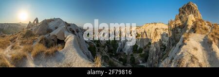 The picturesque panorama of Cappadocia at sunset, amazing Turkey, Mountains and rock formation, big size image, Goreme national park, Love valley Stock Photo