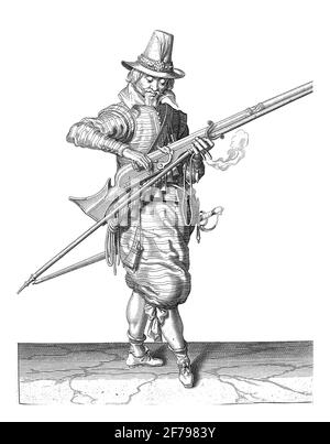 A Soldier, Full Length, to the Right, who closes with his right hand the pan (the powder container) of his musket, vintage engraving. Stock Photo