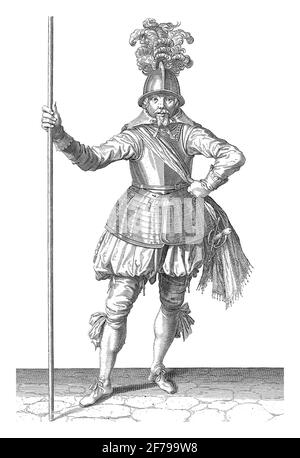 Soldier, viewed from the front, holding his spear upright with his right hand, vintage engraving. Stock Photo