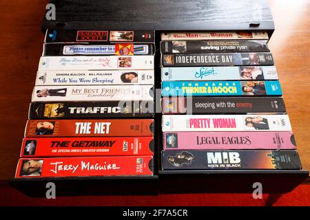 Various VHS cassette tapes inside drawers. Stock Photo