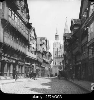 Skioptic image with motifs from Braunschweig. Street with Katharinenkirche in the background. The image has been stored in cardboard labeled: Braunschweig. Iv. 6. Stock Photo